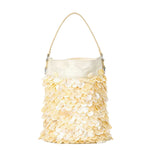 The Staud Lila Mini Bag is a cream-colored purse with a single handle, featuring layered round sequins on the lower half—ideal as an elegant evening accessory.
