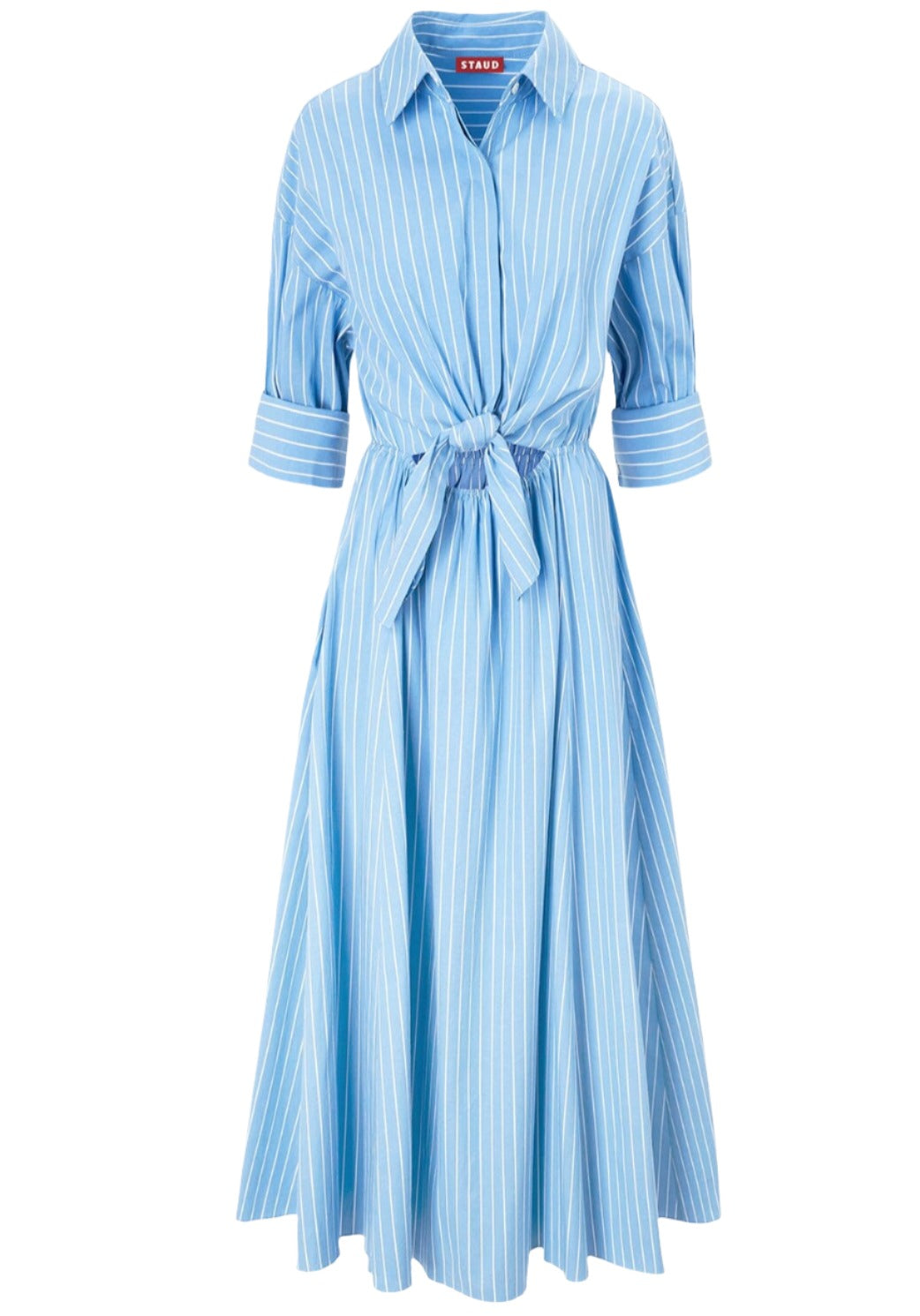 The Staud Lisa Dress, crafted by Staud, features a blue and white striped cotton poplin fabric with a belted waist, rolled-up sleeves, and a flared skirt.