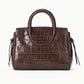 Staud Maude Mini Carryall in brown croc-embossed leather with round top handles and side ties.