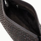Close-up of the Staud Maude Woven Soft Clutch in dark brown leather, showing its spacious interior with a zippered pocket and a signature knotted tie detail.