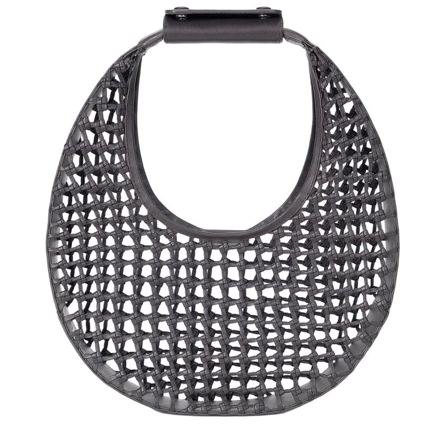 The Staud Moon Hand-Knotted Tote Bag features a black, round, open-weave leather lattice design with a solid top handle.