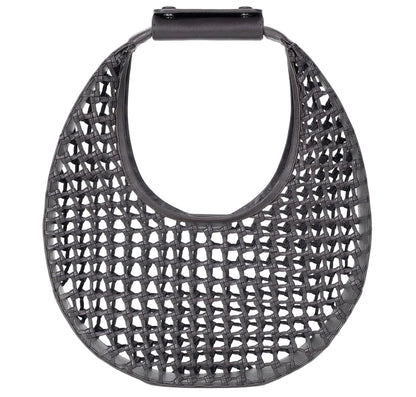 The Staud Moon Hand-Knotted Tote Bag features a black, round, open-weave leather lattice design with a solid top handle.