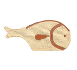The Pesce Raffia Clutch by Staud is a fish-shaped accessory made from natural raffia with brown leather trim and a practical top zipper.