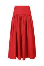 The Staud Procida Linen Skirt is a high-waisted, red A-line midi skirt with a gathered, flared design, solid waistband, and curved yoke for added flair, shown against a white background.