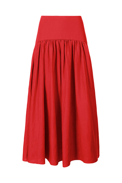 The Staud Procida Linen Skirt is a high-waisted, red A-line midi skirt with a gathered, flared design, solid waistband, and curved yoke for added flair, shown against a white background.