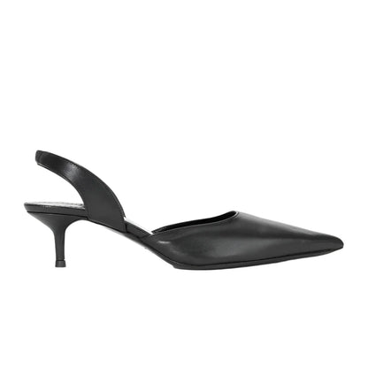 Staud's Sebastion Slingback is a luxurious nappa leather black pointed-toe heel with a delicate strap and low heel, elegantly showcased against a white background.