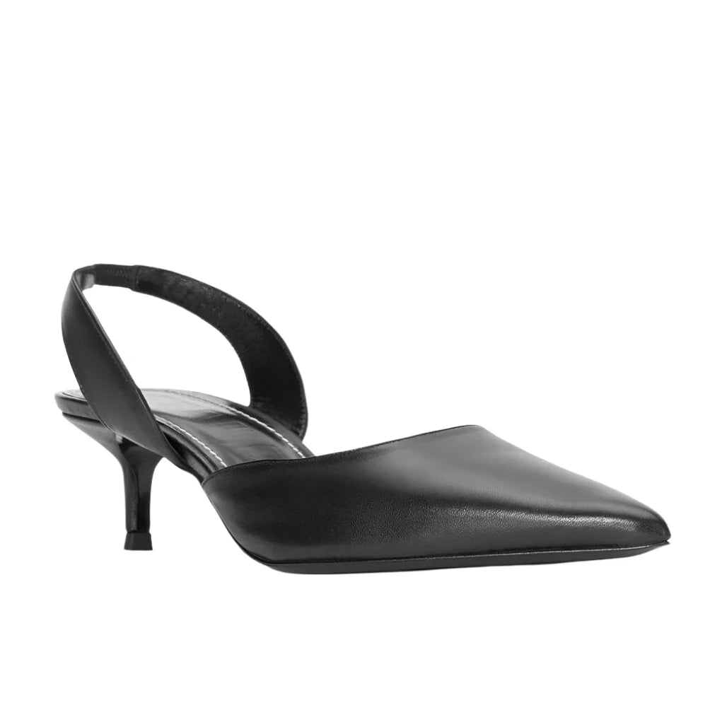 The Staud Sebastion Slingback is a luxurious black pointed-toe shoe made from nappa leather, complete with a chic low heel.