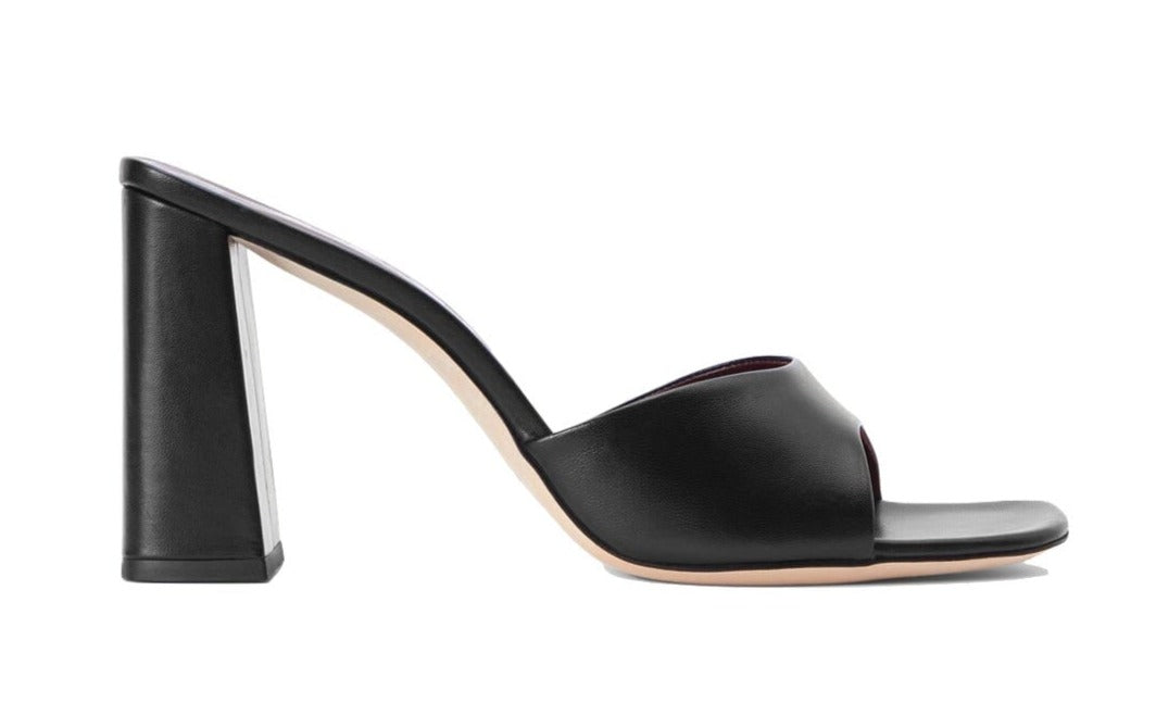 A pair of Staud Sloane Heel sandals with a chunky heel.