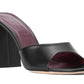 A women's black leather mule with a chunky heel by Staud Sloane Heel.