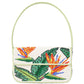 Introducing the Staud Tommy Beaded Bag, a stunning eco-friendly handbag made from vegan leather with a cream background and a hand-beaded floral design featuring green leaves and vibrant bird-of-paradise flowers. It includes a flap closure and a light green strap for added style.