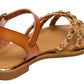 The Steve Madden Kids Girls’ Gillian Sandal features a strappy design with an ankle strap, woven front bands, and toe straps adorned with multicolored rhinestone embellishments.
