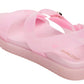 A rear view of the Girls’ Jelly Mona Sandal by Steve Madden Kids, featuring pink translucent crisscross straps and a thick flatform sole. The insole is stamped with “STEVE MADDEN” in gold letters.