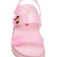 Introducing the Steve Madden Kids Girls’ Jelly Mona Sandal—a pink, dad-inspired sandal featuring a thick flatform sole, two adjustable straps with gold buckles, and a small red heart printed on the insole. It’s the perfect choice for your little fashionista.