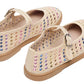 A pair of Steve Madden Kids Girls’ Roree Rhinestones Flats in beige, featuring a buckle strap and multicolored rhinestone embellishments on the sides and tops.