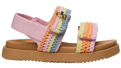 The Steve Madden Kids Toddlers’ Mona Sandal features a tan sole, a pink base, and pastel crochet straps in shades of pink, yellow, green, blue, and orange with a gold buckle detail. This charming slingback sandal offers comfort and playful style for little feet.