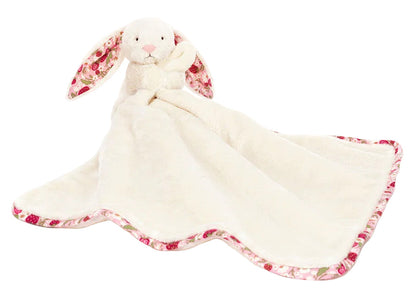The Jellycat Blossom Cream Bunny 'Berry' Soother is a plush white security blanket with floral-patterned ears and trim, perfect for snuggles and an adorable baby gift.