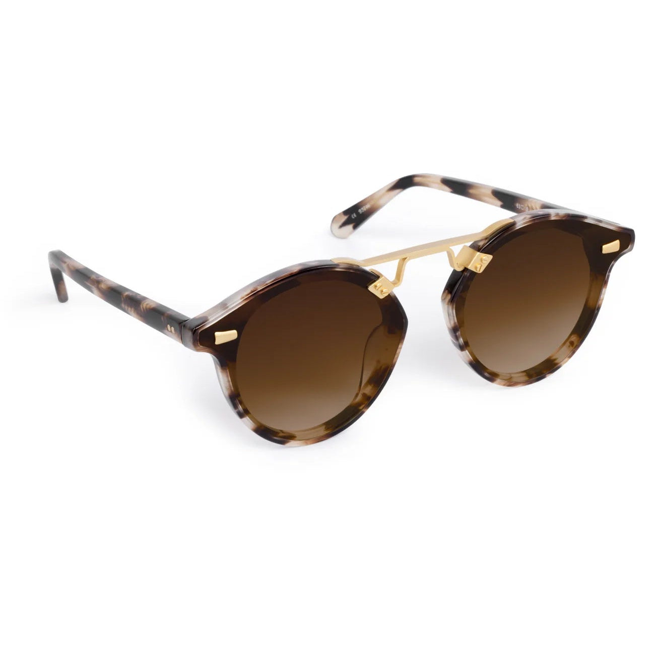 Krewe STL Nylon Sunglasses feature round tortoiseshell frames, brown gradient flat nylon lenses, and a gold metal bridge, shown on a white background.