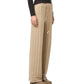 A person wearing the Guest in Residence Stripe Lounge Pant, a dark long-sleeve top, and beige shoes stands against a white background.
