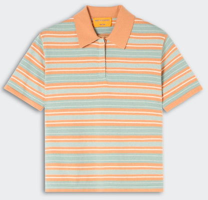 The Short Sleeve Stripe Rugby by Guest in Residence features orange, white, and light blue stripes with a solid orange collar and partial button placket for a stylish layered look.