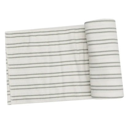 The Angel Dear Modal Rib Stripe Desert Sage Swaddle Blanket features a rolled-up gray and white striped fabric, with a section unrolled and laid flat to highlight its soft and versatile design, making it ideal for cozy swaddles.