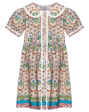 The Girls' Sally Dress by Hunter Bell NYC features short sleeves, a knee-length cut, floral pattern, lace trim, button-down front, and a Peter Pan collar in beige, blue, green & orange—perfect for a charming mommy & me look.