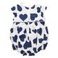 A white Pink Chicken Baby Girls' Sana Bubble romper with short sleeves, covered in large navy hearts.