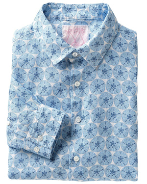 The Pink House Mustique Printed Linen Shirt from Pink House Mustique features a pre-washed, folded design with a blue floral geometric pattern. Crafted from premium linen, it ensures both comfort and style while meeting OEKO-TEX standards for sustainability and quality.