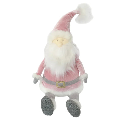 The MON AMI Santa Shelf Sitter - Dusty Rose by Mon Ami features a charming pink Santa doll with a long white beard, wearing a pink hat and suit, gray mittens, and gray shoes. This adorable piece serves as perfect Christmas decor or a charming holiday accent to liven up any festive space.