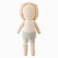 Sawyer the Lion - Little 13" by Cuddle + Kind, a stuffed lion toy with a fuzzy mane, beige body, and light green knitted shorts, shown from the back against a white background.
