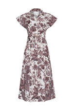 The Sawyer Dress by Cara Cara showcases a timeless shirtdress silhouette with short sleeves, a collared neckline, front button closure, and a belted waist. Its all-over maroon floral and paisley print brings an elegant touch to this effortlessly chic poplin A-line dress.