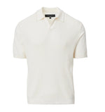 The Saxon Silk-Cotton Polo Shirt by Rag & Bone is a white short-sleeve knit polo with a textured pattern, ribbed cuffs and hem, and a refined Johnny collar, crafted from a silk-cotton blend.