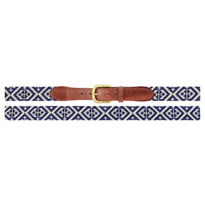 The Scarsdale Belt by Smathers & Branson features a woven geometric blue and white pattern with brown Italian leather accents and a brass buckle, shown laid flat on a white background.