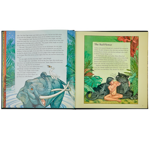 A copy of *The Jungle Book, Leather* by Graphic Image displays vivid illustrations of a jungle scene, featuring an elegantly portrayed elephant on the left page and Mowgli from Rudyard Kipling's adventures surrounded by animals on the right.