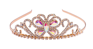 The Boutique Butterfly Jewel Tiara by Great Pretenders features gold detailing, rhinestones, and iridescent butterfly-shaped gems—an enchanting accessory for any occasion. Shown against a white background.