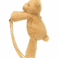 A tan Jellycat Smudge Bear Backpack by Jellycat, shaped like a teddy bear and shown in profile, features two beige adjustable straps visible against a white background.