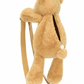 The Jellycat Smudge Bear Backpack by Jellycat features adjustable straps and a visible zipper on the back, making it both adorable and practical.