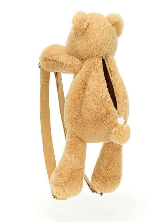 The Jellycat Smudge Bear Backpack by Jellycat features adjustable straps and a visible zipper on the back, making it both adorable and practical.
