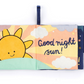 A Jellycat Hello Moon Fabric Book open to a colorful page showing a smiling sun with the text "Good night sun!" in a playful font. Perfect for little hands, this interactive fabric book from Jellycat sparks joy and curiosity.