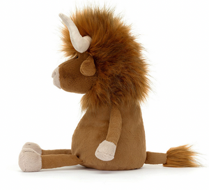 A sitting brown plush toy with silky fur, a shaggy mane, two small horns, and a long tail, viewed from the side. Meet Jellycat Ramone Bull by Jellycat.