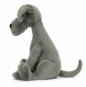 A gray plush dog toy, resembling a Jellycat Zeus Great Dane, is shown sitting in a side profile view against a white background.