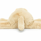 A Jellycat Wanderlust, viewed from the back, lying flat on its stomach with limbs spread outwards—a chilled softie perfect for any traveller's friend.