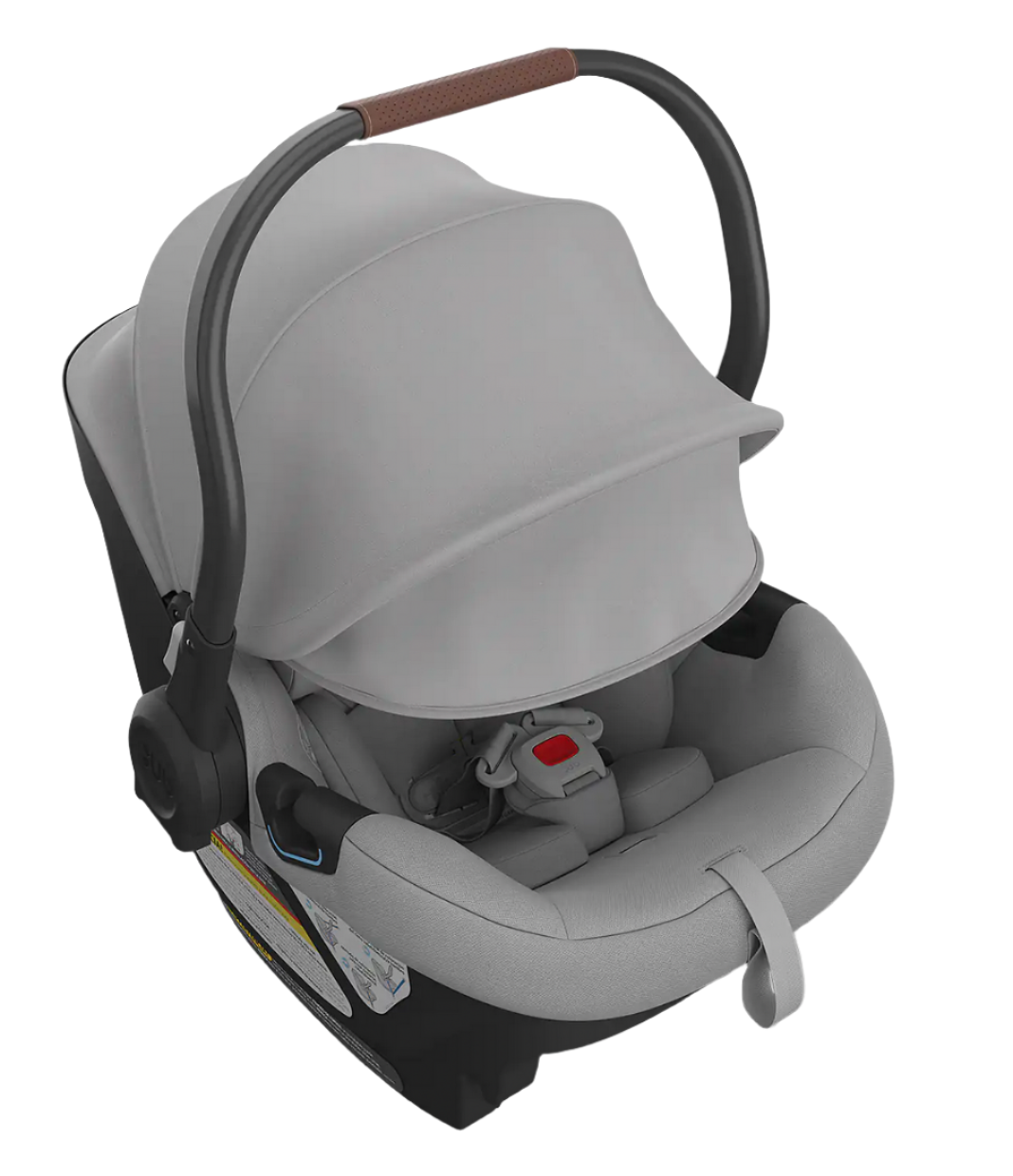 The UPPAbaby Aria Carseat by UPPAbaby is a grey infant car seat that features an extra-large canopy, a five-point harness, and a black base. It has a carrying handle with a brown grip and incorporates SmartSecure® technology for added safety.