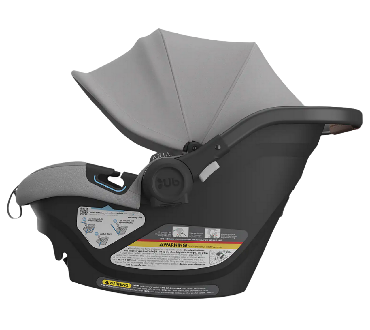 The UPPAbaby Aria Carseat by UPPAbaby is a gray and black infant car seat featuring SmartSecure® technology and an attached extra-large canopy. The seat also displays safety instructions and warning labels on the side.