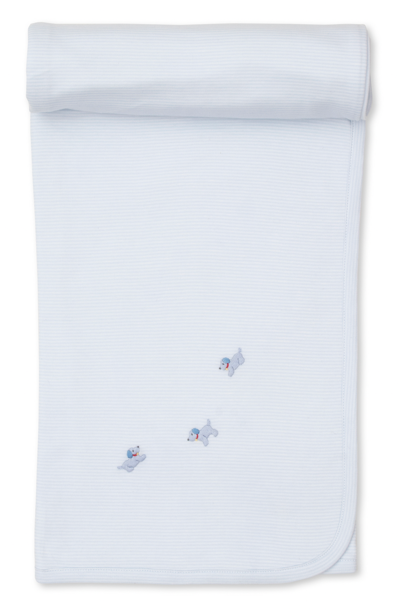 A light blue, soft striped blanket from Kissy Kissy featuring hand-embroidered puppies in the center.