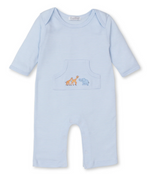 The Kissy Kissy Jungle Oasis Striped Playsuit by Kissy Kissy is a light blue baby boy playsuit with long sleeves, crafted from soft Pima cotton. It features a small embroidered giraffe and elephant on the chest pocket, capturing a charming jungle theme, and snap closures along the legs.