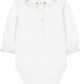 White long-sleeve baby onesie from Tartine et Chocolat, featuring an embroidered flower collar and floral trim embellishments.