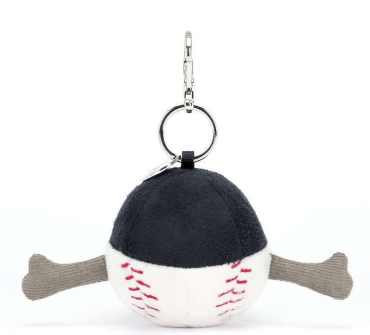 A baseball-themed keychain with a plush baseball wearing a black cap and two crossed bones protruding from either side, this Jellycat Amuseables Sports Baseball Bag Charm makes the perfect Jellycat Baseball Bag Charm.