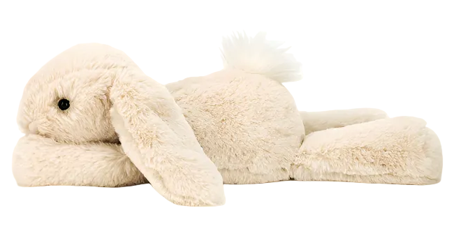 Jellycat’s Smudge Rabbit Medium is a soft plush rabbit with floppy ears and a white tail, lying on its stomach—an adorable baby gift, shown isolated on a white background.