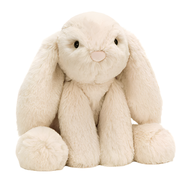 The Jellycat Smudge Rabbit Medium is a cream-colored plush with long floppy ears, round paws, and a pink nose, sitting upright—an adorable baby gift that faces forward.