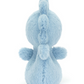 A detailed plush toy with blue, fluffy fabric shaped like a creature standing upright with its back facing the camera is the Jellycat Fluffy Seahorse by Jellycat.